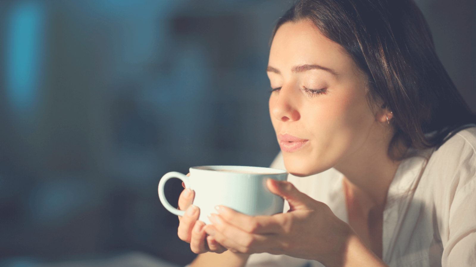Woman blowing coffee 1920 x 1080 px
